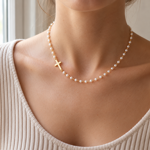 Grace Cross Necklace – dainty gold cross pendant on a white beaded chain